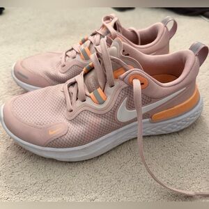 Pink women’s Nike sneakers